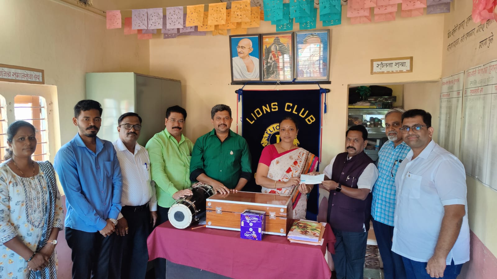 Gift of harmonium and drum to Jeevan Jyoti School