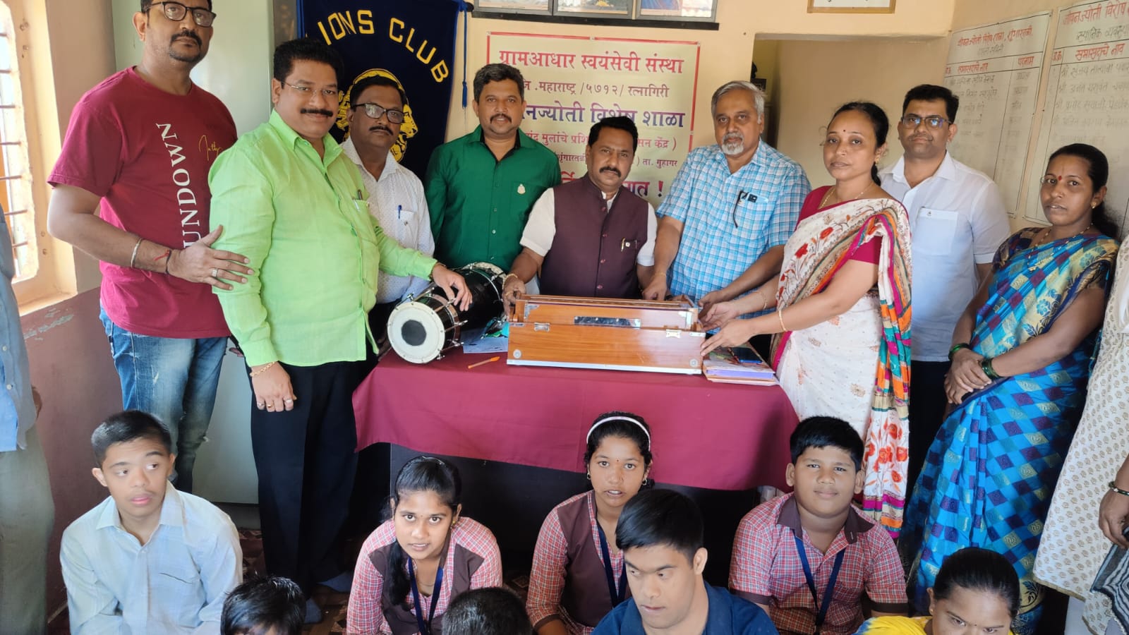 Gift of harmonium and drum to Jeevan Jyoti School