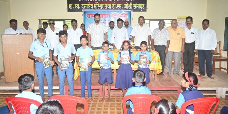 Distribution of booklets to students by Gram Panchayat