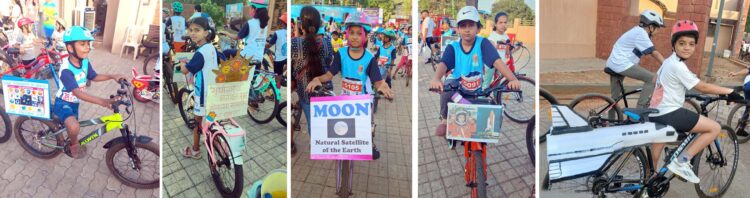 Child astronauts ride bicycles