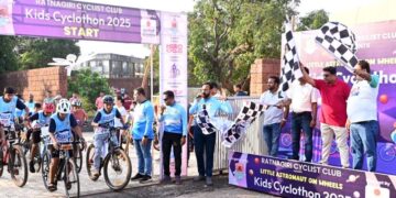 Child astronauts ride bicycles