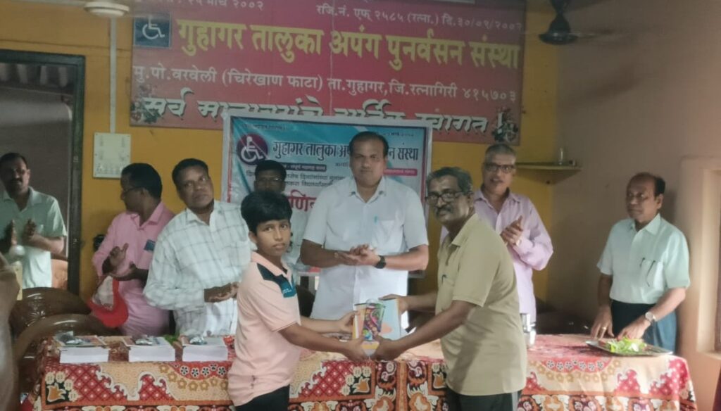 Distribution of educational material in Guhagar Handicapped Institute