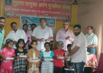 Distribution of educational material in Guhagar Handicapped Institute