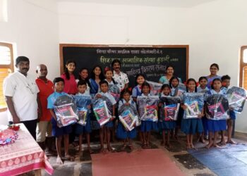 Distribution of educational material to Sade Jambari students