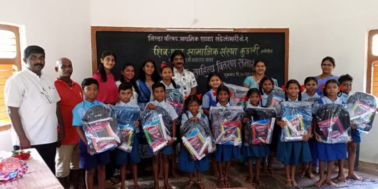 Distribution of educational material to Sade Jambari students