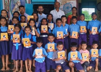 Distribution of notebooks on behalf of BJP to students