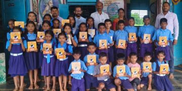 Distribution of notebooks on behalf of BJP to students