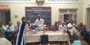 Distribution of educational materials in Kajurli School